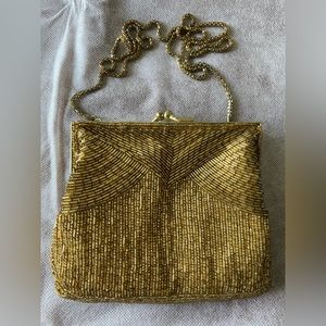 Gold beaded kiss-lock bag (1999)